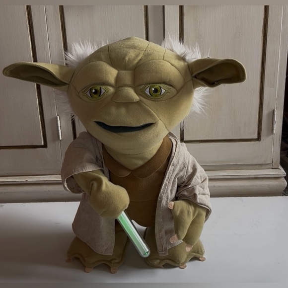 Star Wars Lightsaber Battle Yoda Deluxe 16-Inch Talking
Plush interactive toy